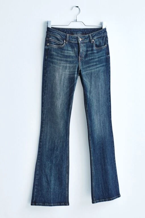Next Own. Low Rise Stretch Flare Jeans With Back Split Hem -Style Haven Shop T93469s scaled