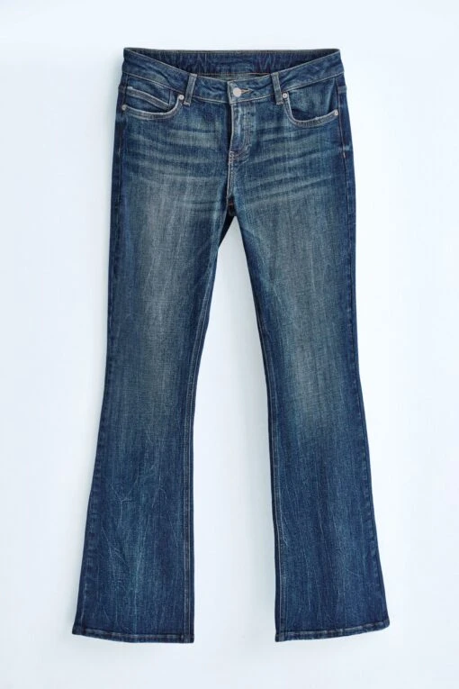 Next Own. Low Rise Stretch Flare Jeans With Back Split Hem -Style Haven Shop T93469s3 scaled